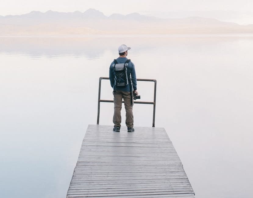 guy in front of a lake